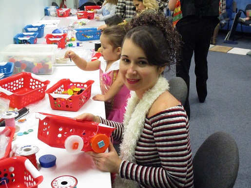 A mother is showing her story basket